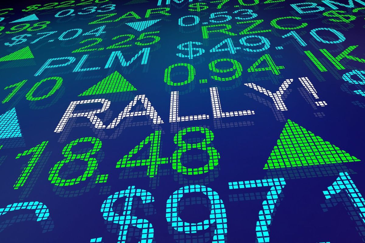 Stock market rally with rising numbers and green arrows.