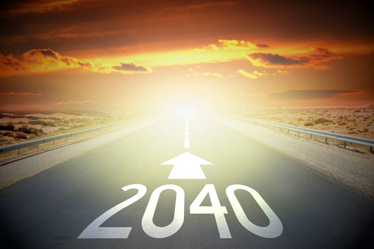 Sunset over desert road with "2040" and arrow pointing forward.