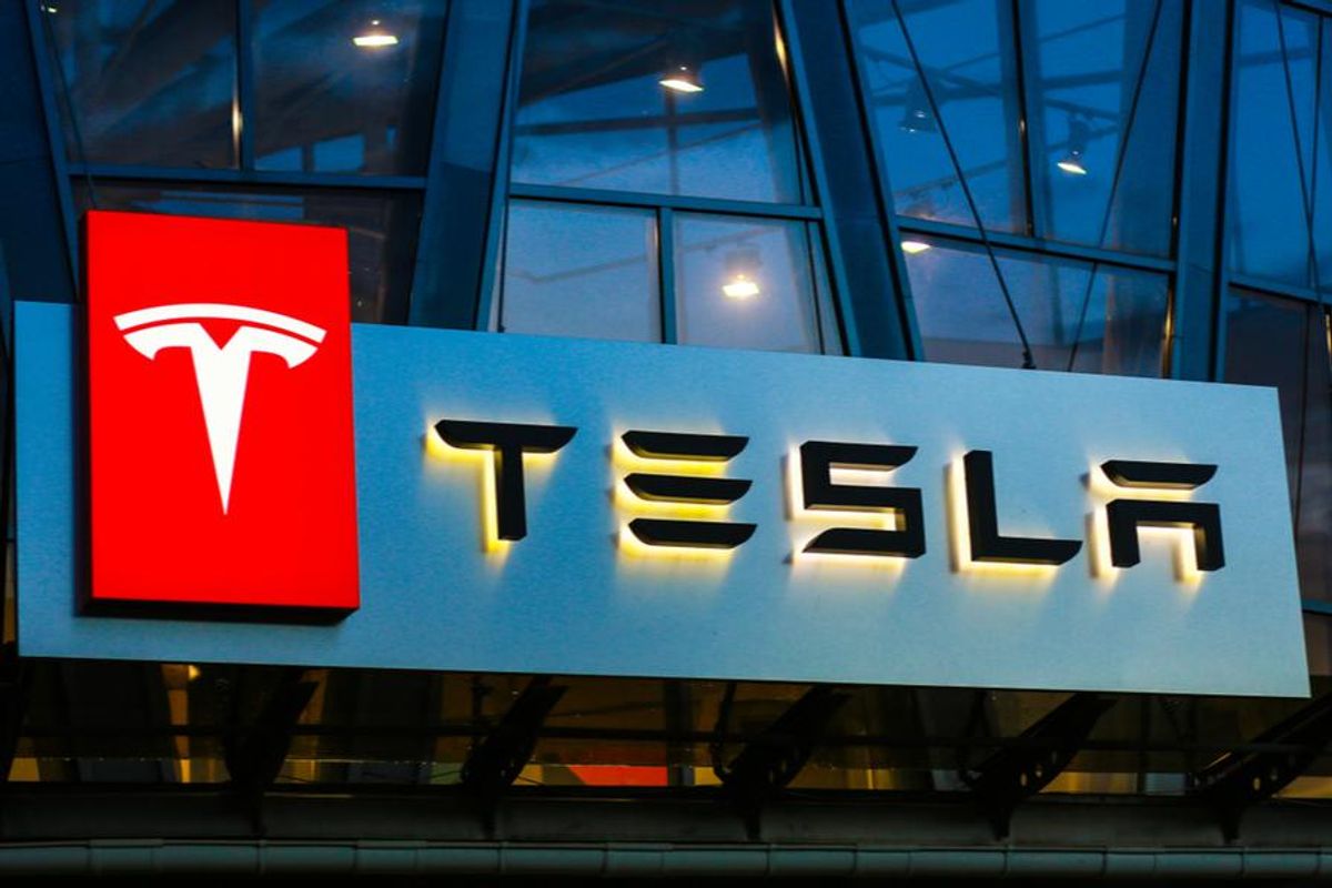 tesla sign on building