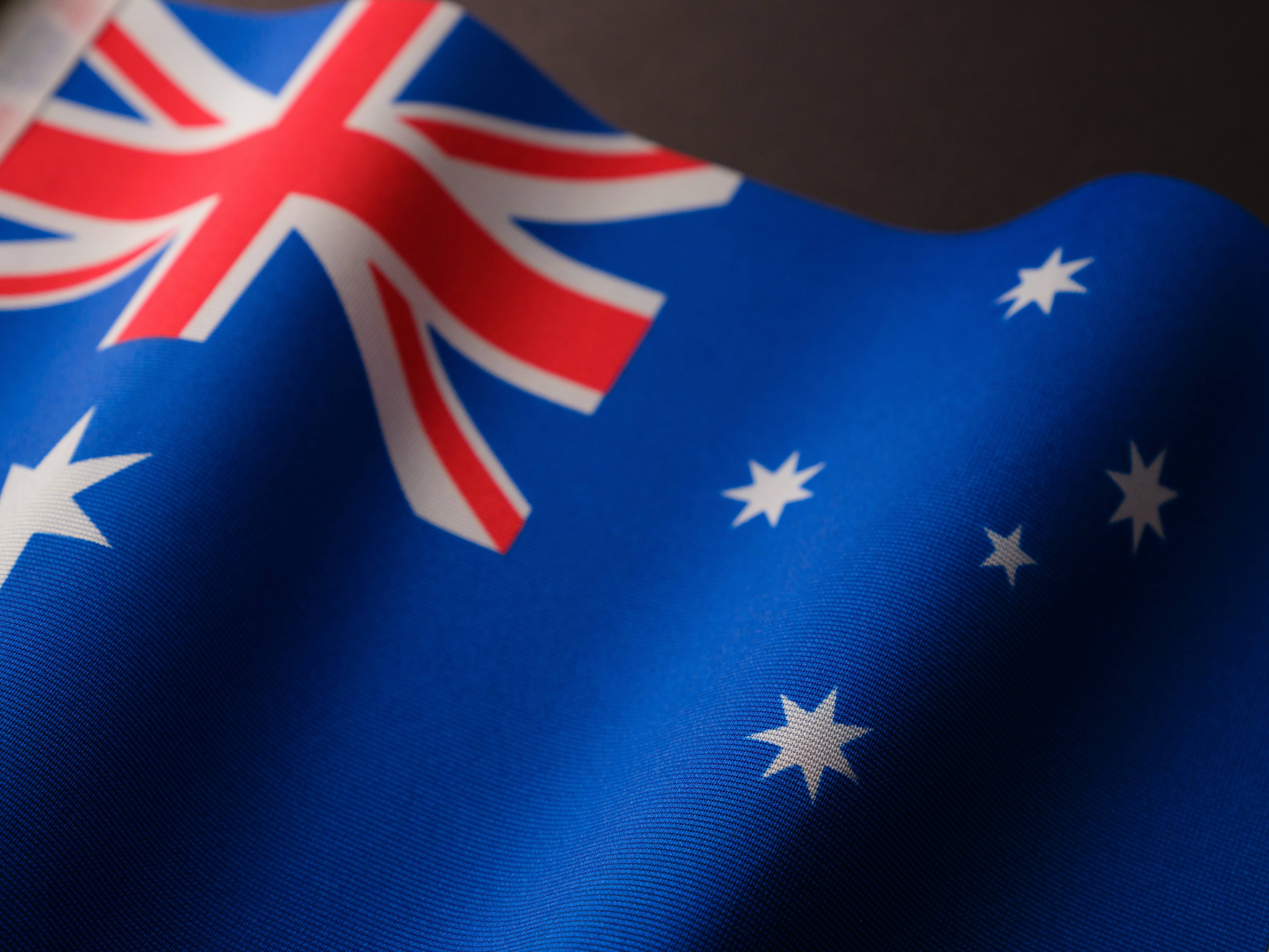 The Australian flag with a blue background, white stars, and the Union Jack in the upper left corner.