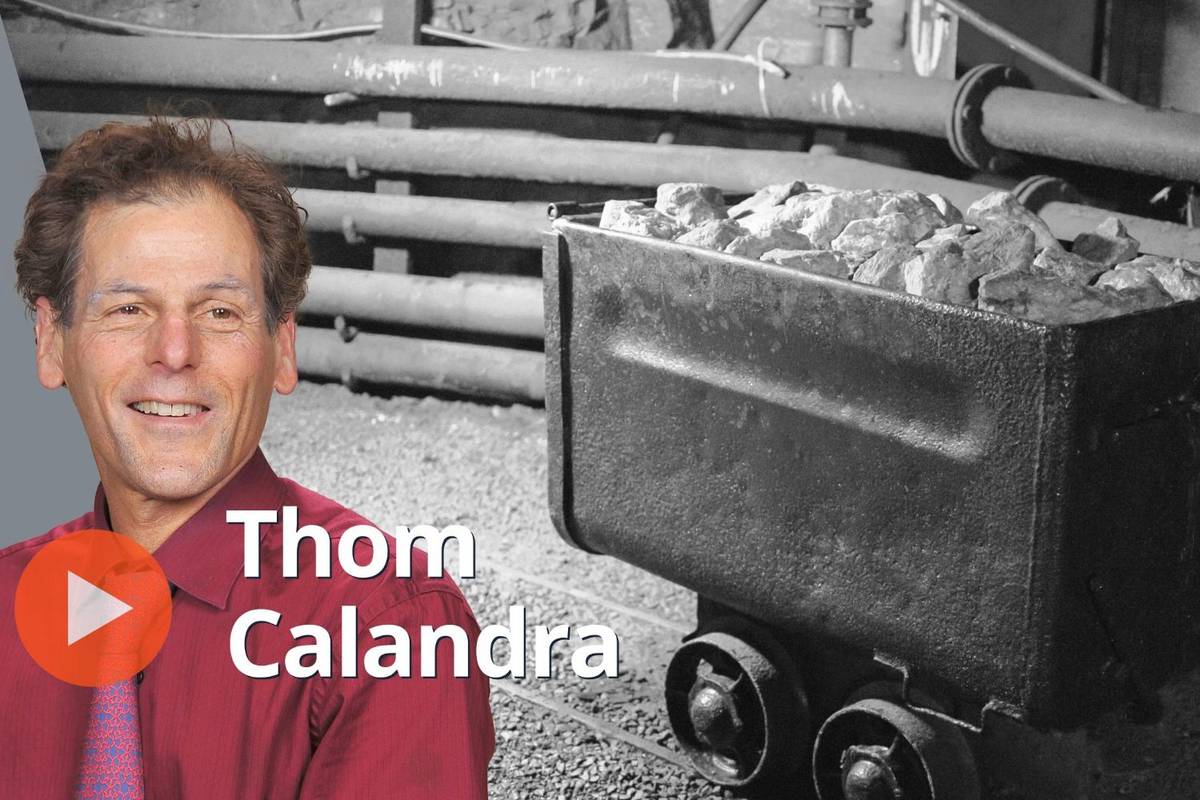 Thom Calandra, ore in mining cart.