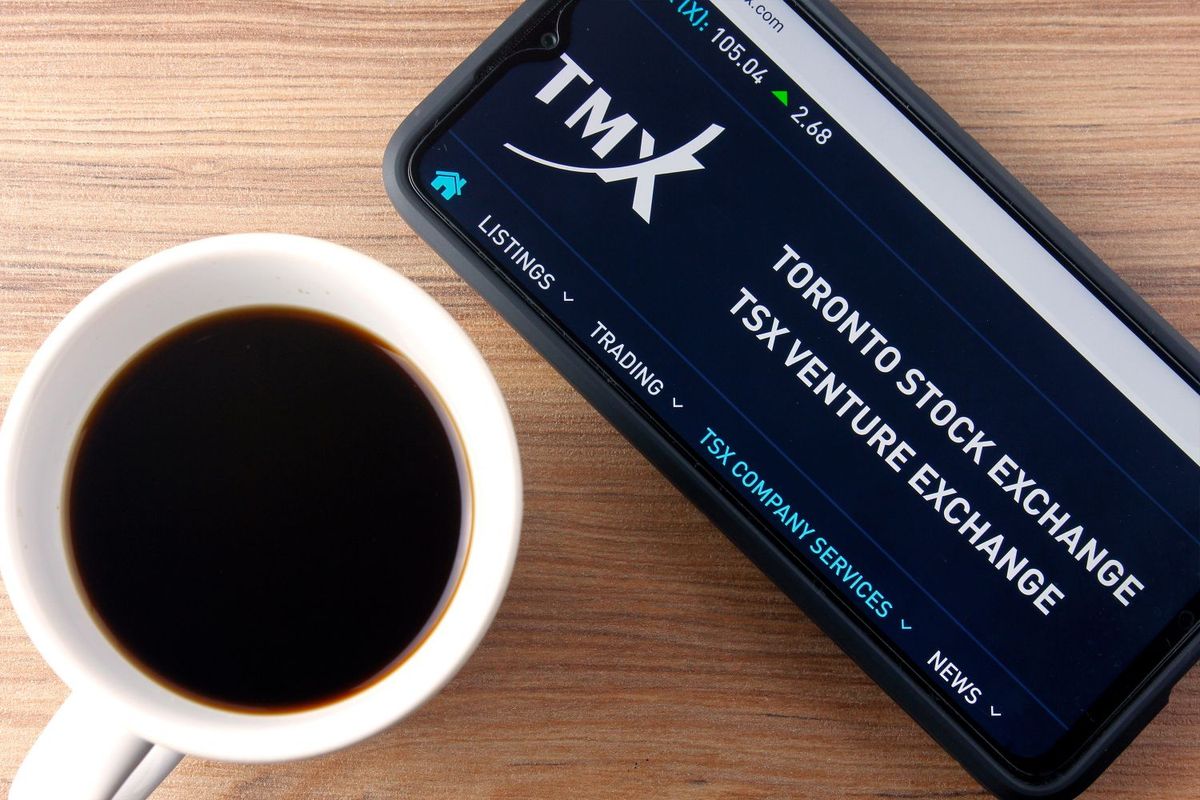TSX and TSXV website on phone screen.