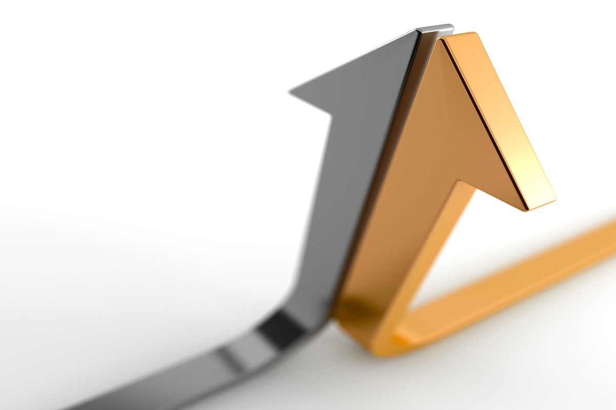 Two 3D arrows, one black and one gold, merge and point upwards on a white background.