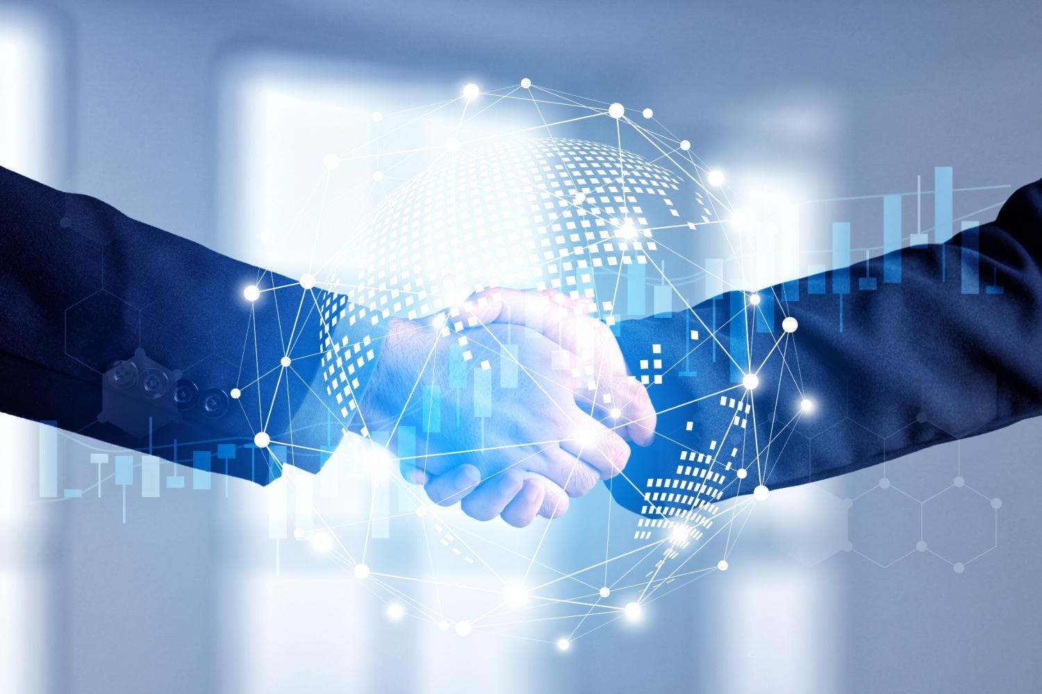 Two businesspeople shaking hands with digital network graphics overlay.