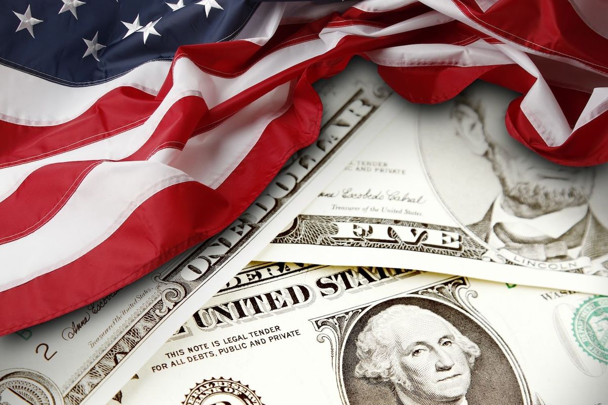 US currency and US flag.