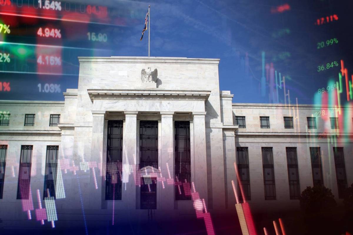 US Federal Reserve building with stock market graph overlay.