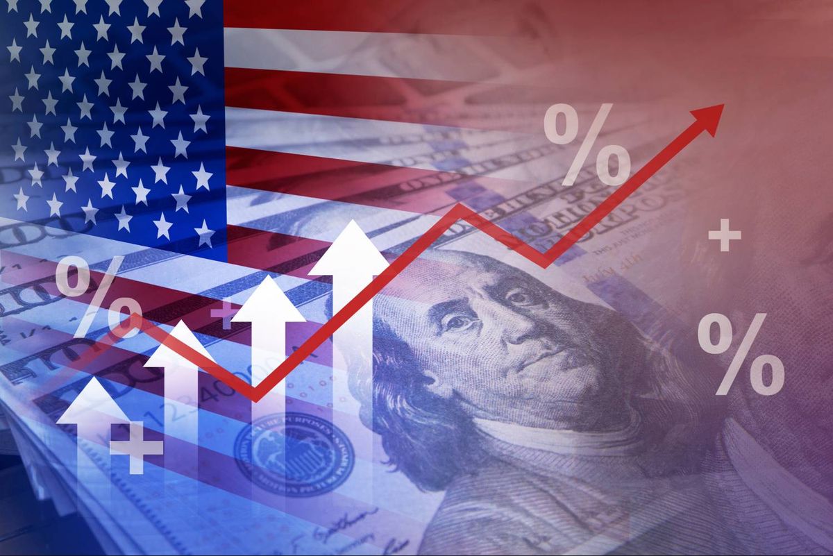 US flag and rising graph on US$100 bills, symbolizing economic growth.