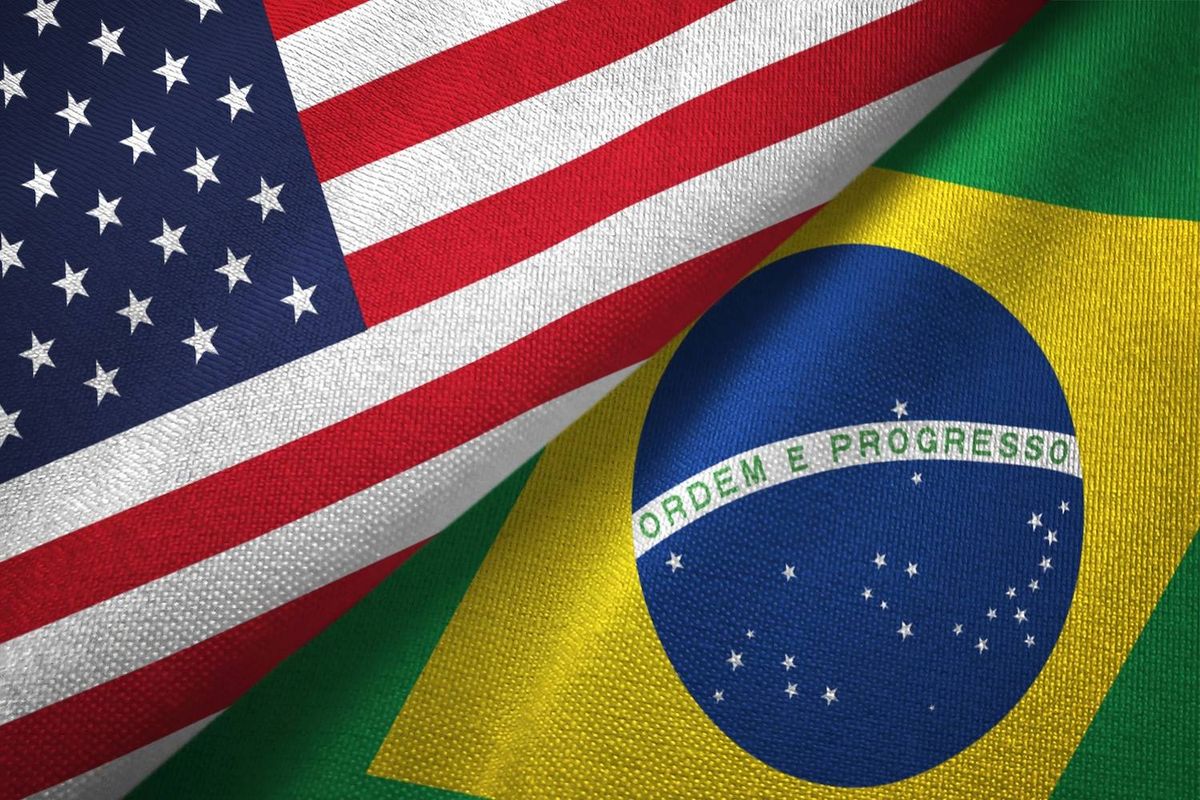USA and Brazil flags overlapping, symbolizing cooperation.