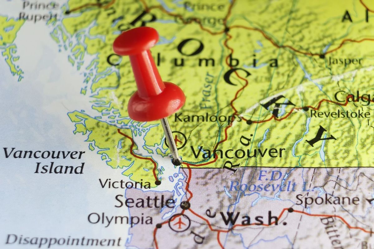Vancouver with a push pin on map.