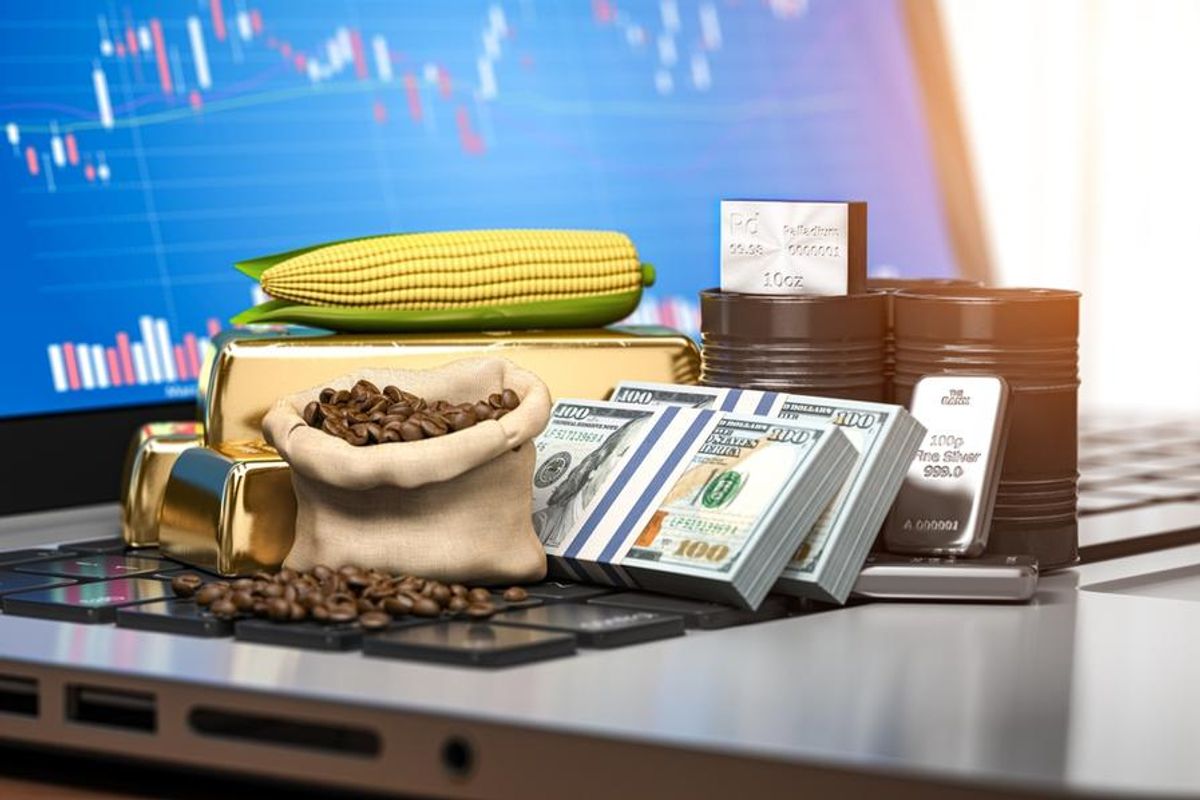 various commodities atop a laptop