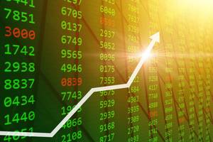 White arrow rises over a green and red financial stock market display with sunlit numbers.