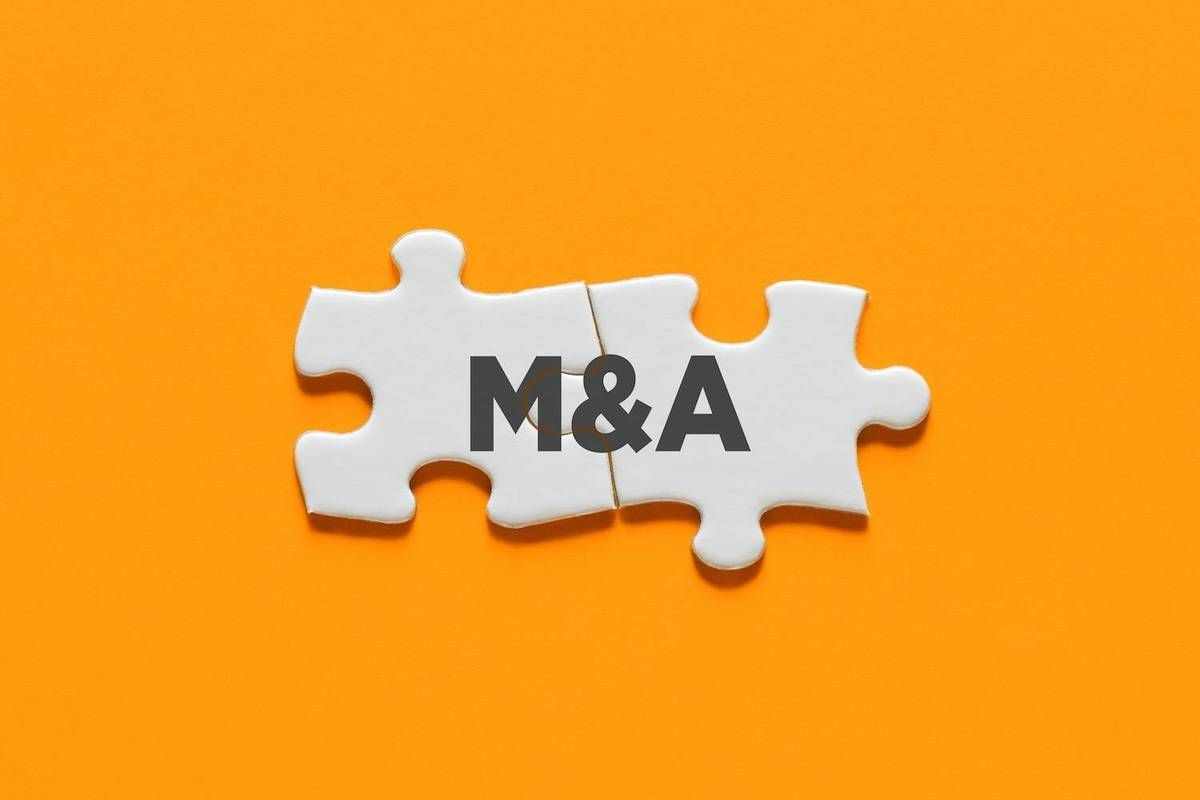 White puzzle pieces with "M&A" on orange background.