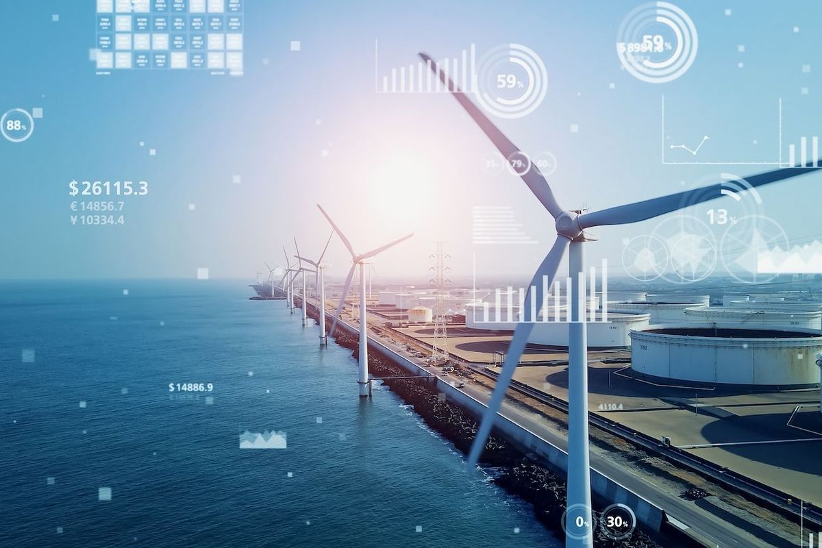 Wind turbines along a dock.
