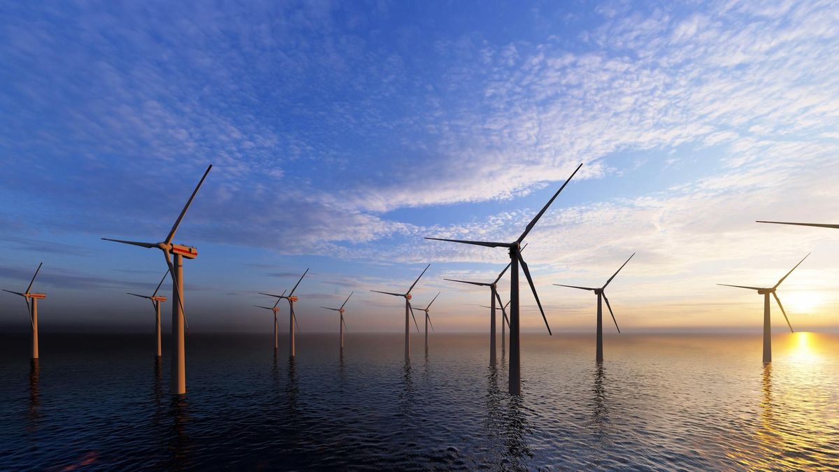 Windmills in the ocean generating alternative energy.