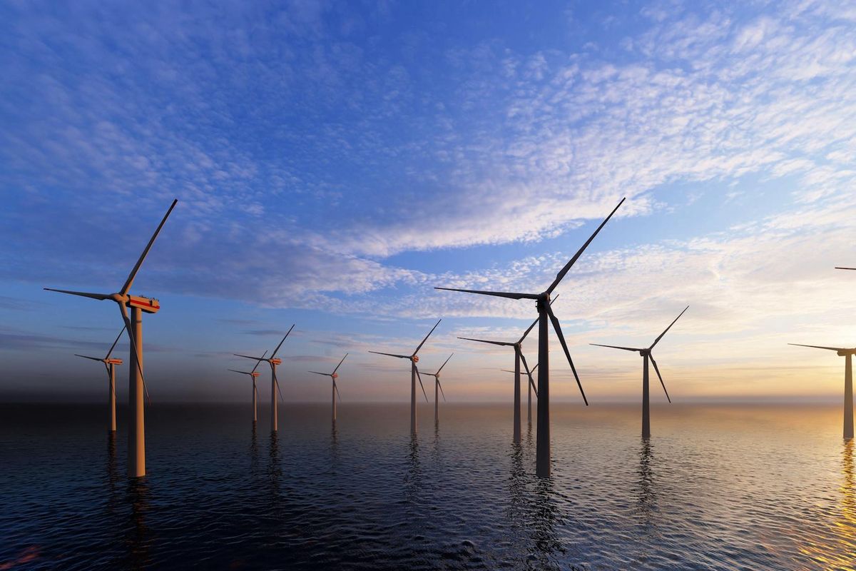 Windmills in the ocean generating alternative energy.
