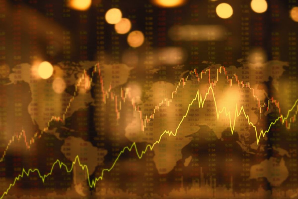 world map with rising stock charts