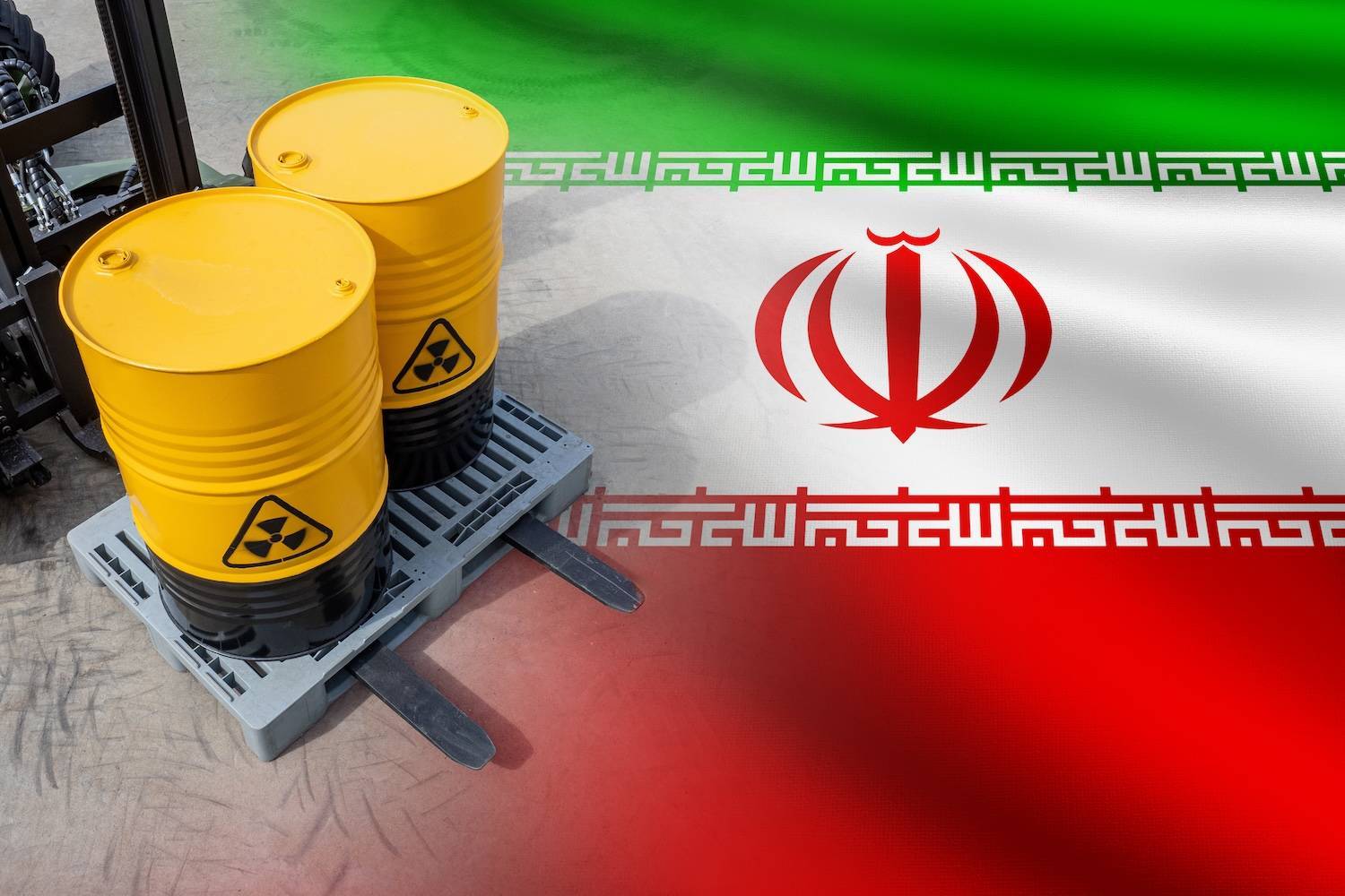 Yellow radioactive barrels on forklift with Iranian flag background.